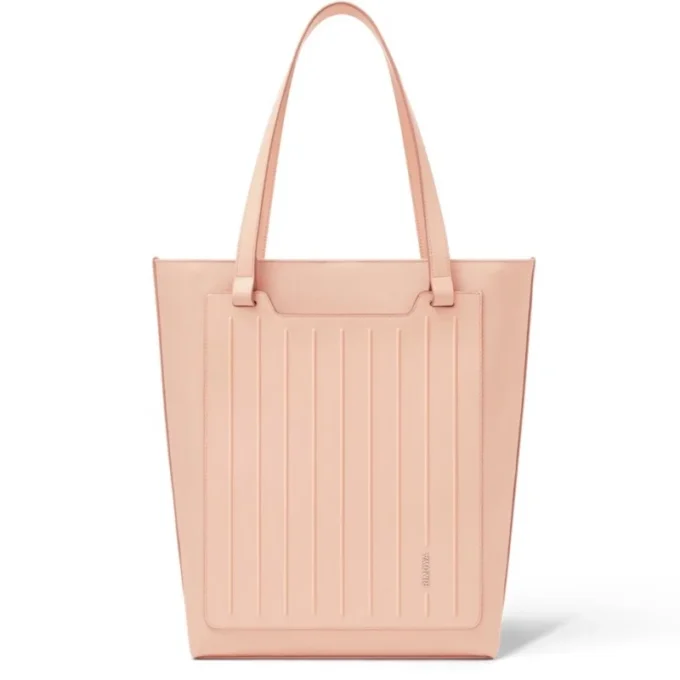 Never Still Vertical in pelle e tela TrageBags