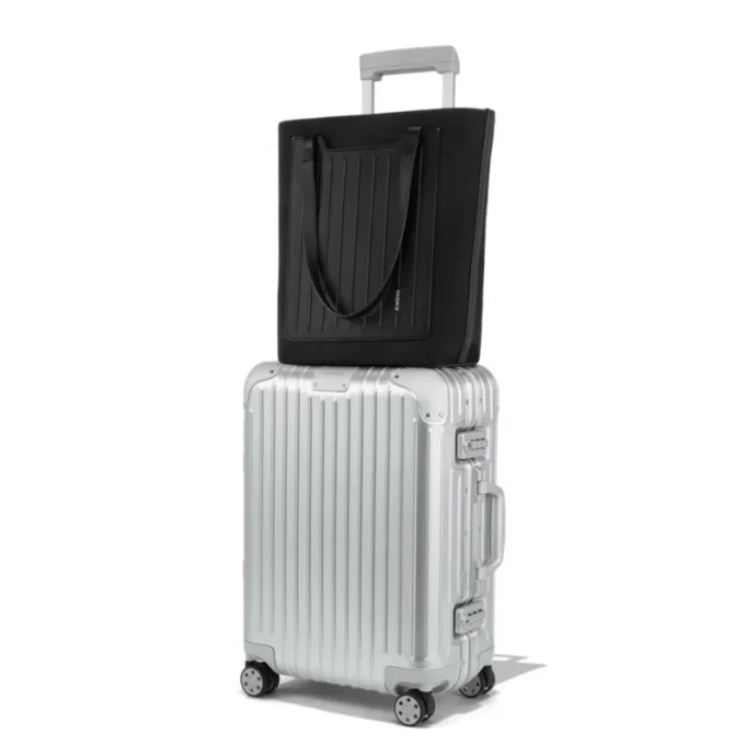 Never Still Vertical in pelle e tela TrageBags