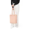 Never Still Vertical in pelle e tela TrageBags