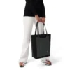 Never Still Vertical in pelle e tela TrageBags